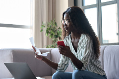 woman figuring out how much to save for an apartment
